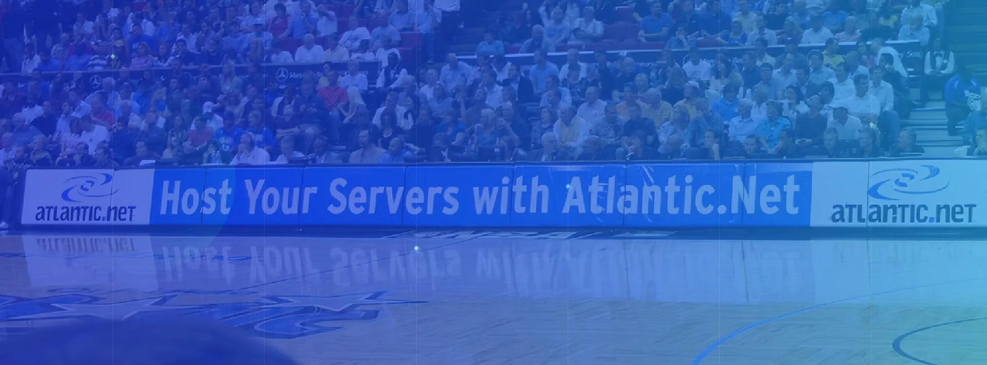 Courtside boards at an Orlando Magic game reading Host Your Servers with Atlantic.Net
